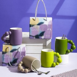 Creative mug with pearl handle