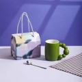 Creative mug with pearl handle